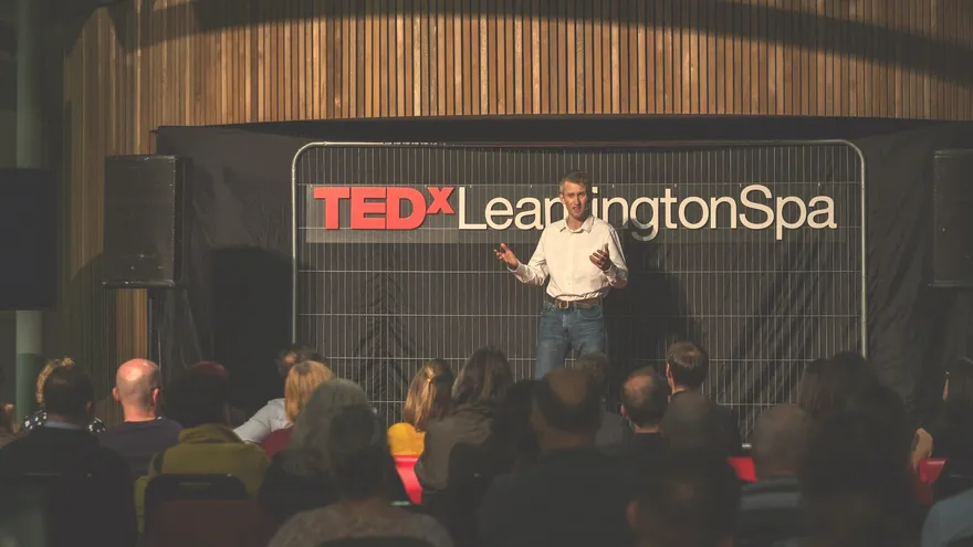 Andrew delivering a TEDx talk